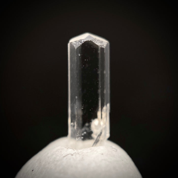 0.29 carat Burmese phenakite drill bit crystal for sale, glass clear, natural termination available at sanctuaryofstones.com photo 9