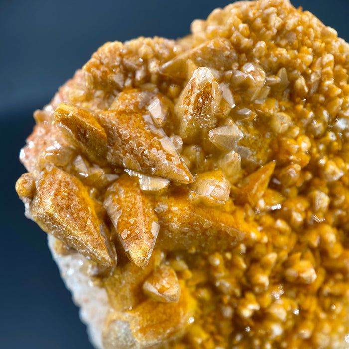 Large Mexican danburite crystal specimen with druzy quartz and golden calcite coating weighing 39.46 grams available on sanctuary of stones dot com photo 5