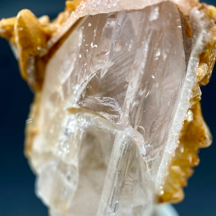 Large Mexican danburite crystal specimen with druzy quartz and golden calcite coating weighing 39.46 grams available on sanctuary of stones dot com photo 9