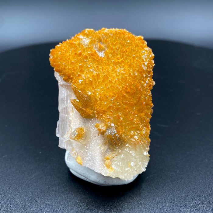 Large Mexican danburite crystal specimen with druzy quartz and golden calcite coating weighing 80.80 grams available on sanctuary of stones dot com photo 1