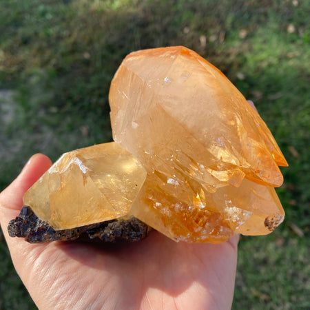 sanctuaryofstones.com Elmwood Mine golden-amber calcite with sphalerite specimen 1