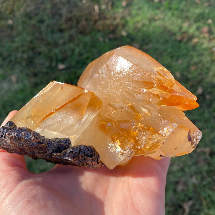 sanctuaryofstones.com Elmwood Mine golden-amber calcite with sphalerite specimen 2