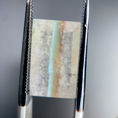 Gilalite in quartz, also known as Medusa Quartz, fancy rectangle cabochon 5.10 carats available on sanctuary of stones dot com