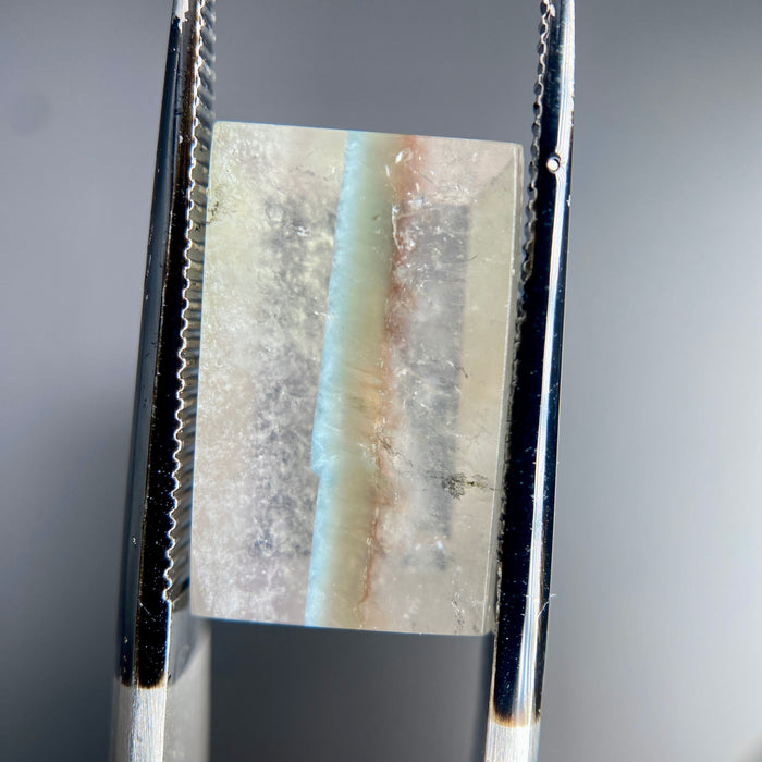 Gilalite in quartz, also known as Medusa Quartz, fancy rectangle cabochon 5.10 carats available on sanctuary of stones dot com