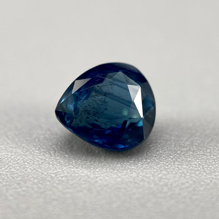 1.05 ct. Sri Lanka Ceylon sapphire pear cut unheated slightly included clarity deep blue with teal undertones available at sanctuaryofstones.com sanctuary of stones dot com, photo2