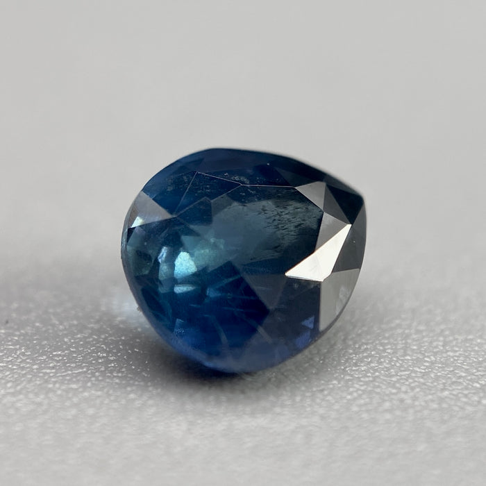 1.05 ct. Sri Lanka Ceylon sapphire pear cut unheated slightly included clarity deep blue with teal undertones available at sanctuaryofstones.com sanctuary of stones dot com, photo6