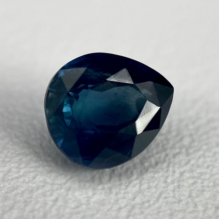 1.05 ct. Sri Lanka Ceylon sapphire pear cut unheated slightly included clarity deep blue with teal undertones available at sanctuaryofstones.com sanctuary of stones dot com, photo3