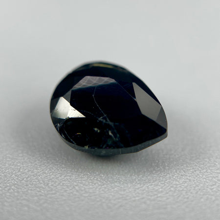 serendibite pear shaped 1.55 carat gemstone, opaque black-blue, very rare gemstone available on sanctuary of stones dot com, sanctuaryofstones.com photo2