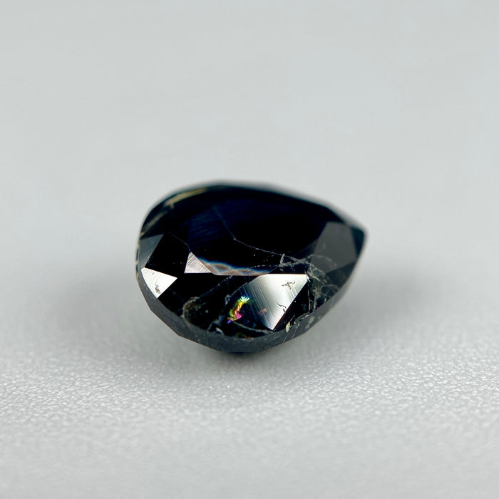 serendibite pear shaped 1.55 carat gemstone, opaque black-blue, very rare gemstone available on sanctuary of stones dot com, sanctuaryofstones.com photo7