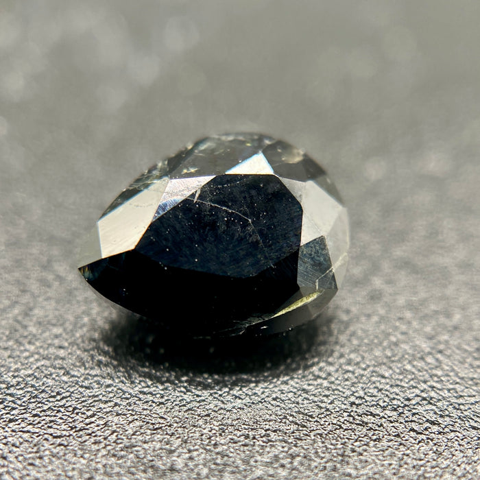 serendibite pear shaped 1.55 carat gemstone, opaque black-blue, very rare gemstone available on sanctuary of stones dot com, sanctuaryofstones.com photo4