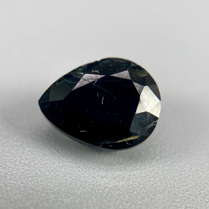 serendibite pear shaped 1.55 carat gemstone, opaque black-blue, very rare gemstone available on sanctuary of stones dot com, sanctuaryofstones.com photo8