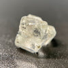 0.81 gram raw Madagascar phenakite crystal with tourmaline inclusions available at sanctuaryofstones.com