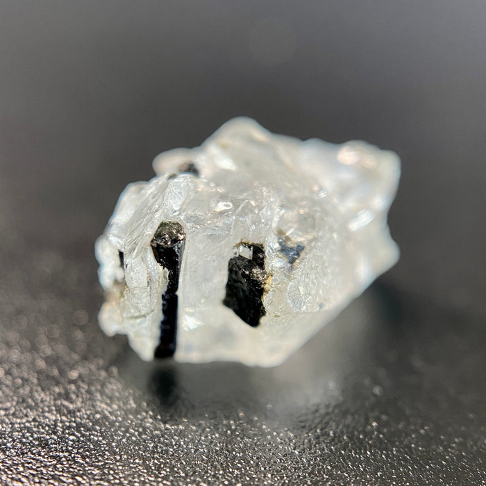 0.93 gram Madagascar phenakite crystal with tourmaline inclusions available at sanctuaryofstones.com