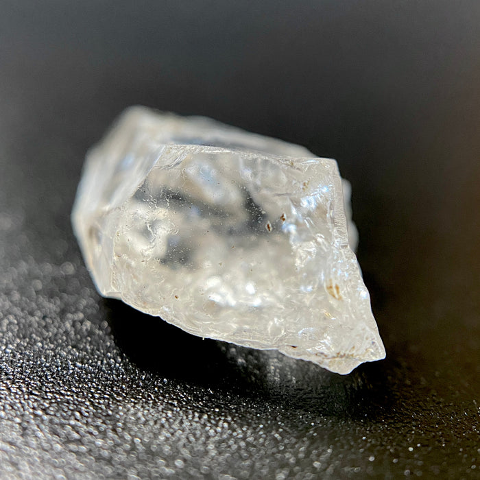1.27 gram raw Madagascar phenakite crystal with trace tourmaline available at sanctuaryofstones.com