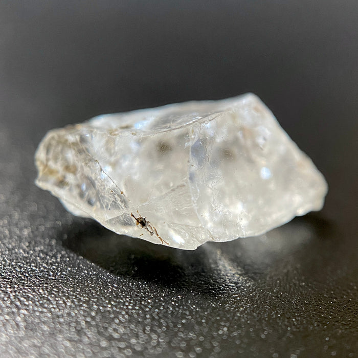 1.27 gram raw Madagascar phenakite crystal with trace tourmaline available at sanctuaryofstones.com