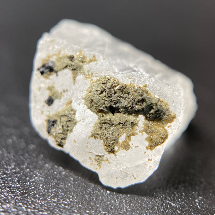 1.59 gram raw Madagascar phenakite crystal with tourmaline inclusions available at sanctuaryofstones.com