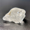 1.80 raw madagascar phenakite crystal with tourmaline inclusions available at sanctuaryofstones.com