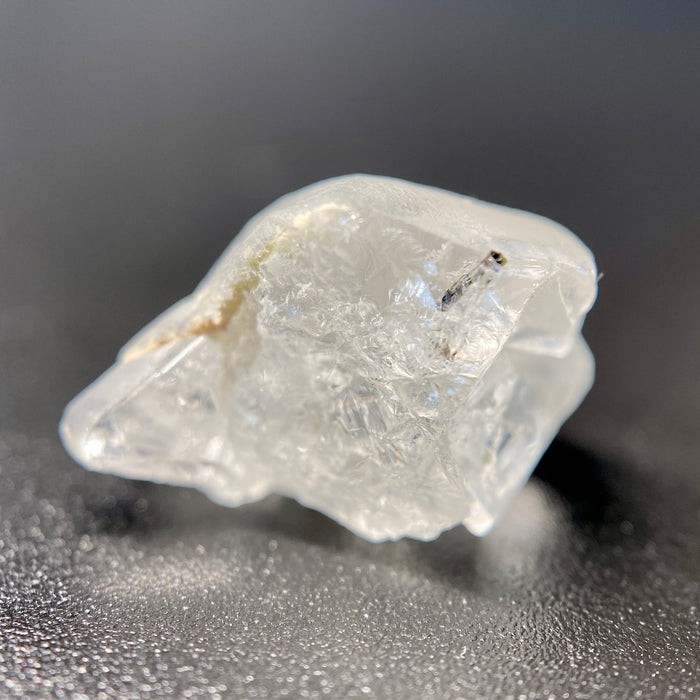 1.80 raw madagascar phenakite crystal with tourmaline inclusions available at sanctuaryofstones.com