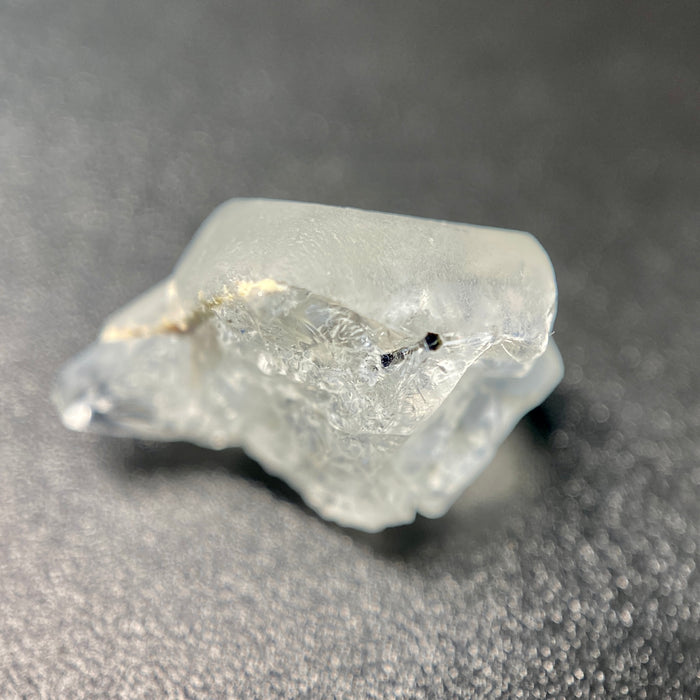 1.80 raw madagascar phenakite crystal with tourmaline inclusions available at sanctuaryofstones.com