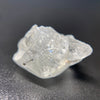 1.80 raw madagascar phenakite crystal with tourmaline inclusions available at sanctuaryofstones.com