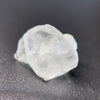 1.80 raw madagascar phenakite crystal with tourmaline inclusions available at sanctuaryofstones.com