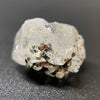 1.95 gram raw Madagascar phenakite crystal with a lot of tourmaline inclusions available at sanctuaryofstones.com