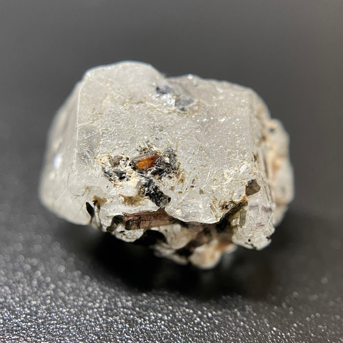 1.95 gram raw Madagascar phenakite crystal with a lot of tourmaline inclusions available at sanctuaryofstones.com