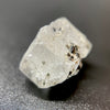 1.95 gram raw Madagascar phenakite crystal with a lot of tourmaline inclusions available at sanctuaryofstones.com