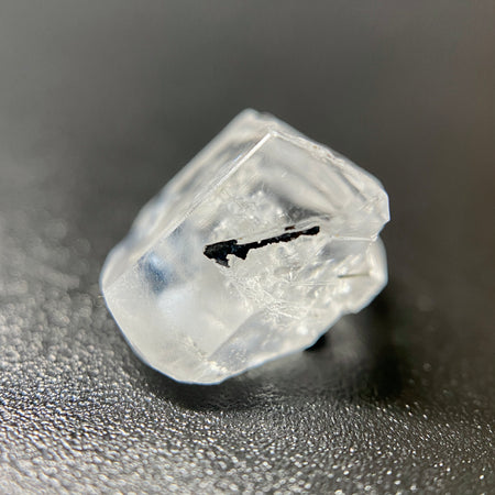 1 gram optically clear raw Madagascar phenakite crystal with tourmaline inclusions available at sanctuaryofstones.com