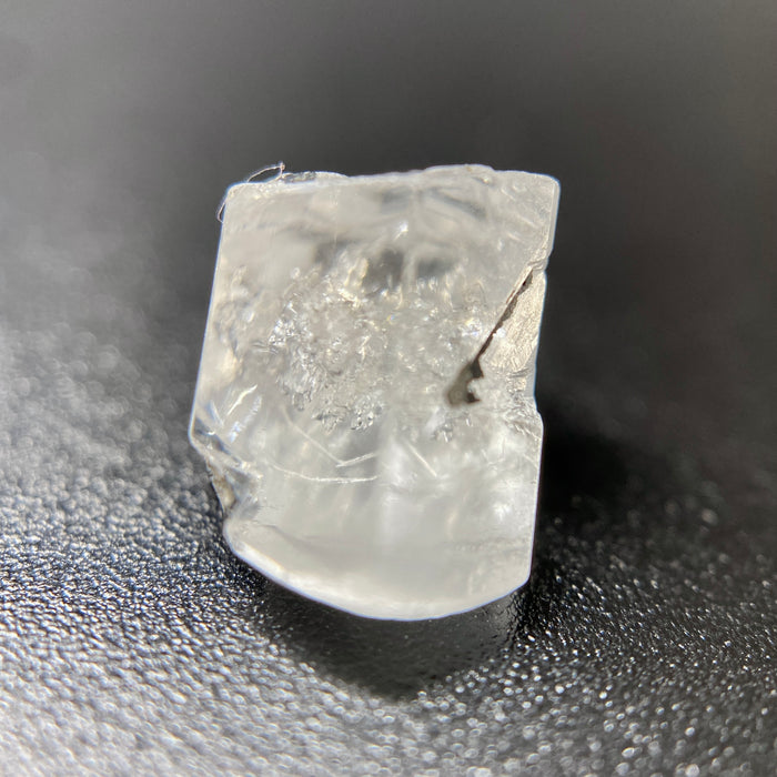1 gram optically clear raw Madagascar phenakite crystal with tourmaline inclusions available at sanctuaryofstones.com