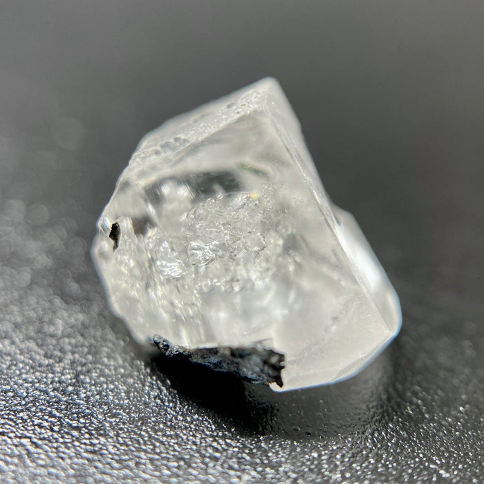 1 gram optically clear raw Madagascar phenakite crystal with tourmaline inclusions available at sanctuaryofstones.com