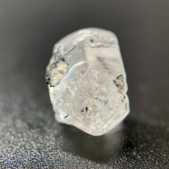 1 gram optically clear raw Madagascar phenakite crystal with tourmaline inclusions available at sanctuaryofstones.com