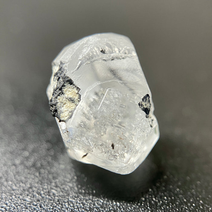 1 gram optically clear raw Madagascar phenakite crystal with tourmaline inclusions available at sanctuaryofstones.com