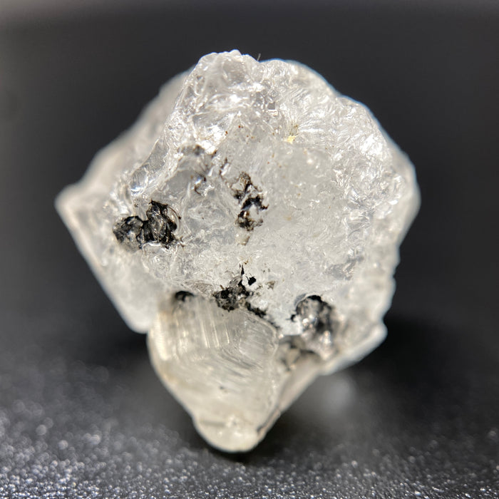 3.90 gram raw Madagascar phenakite crystal with tourmaline inclusions available at sanctuaryofstones.com