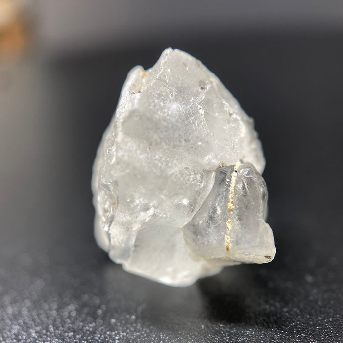 3.90 gram raw Madagascar phenakite crystal with tourmaline inclusions available at sanctuaryofstones.com