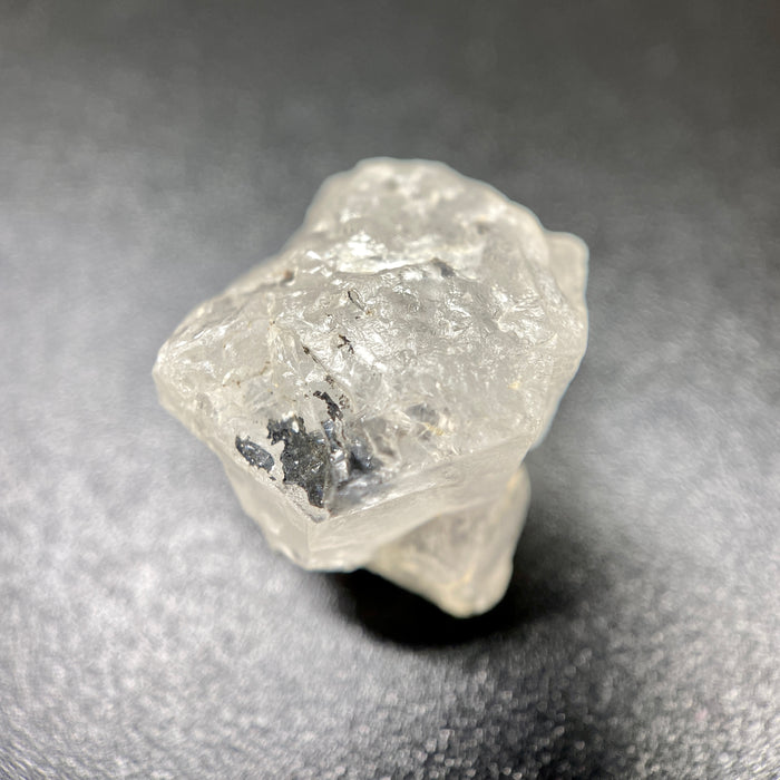 3.90 gram raw Madagascar phenakite crystal with tourmaline inclusions available at sanctuaryofstones.com