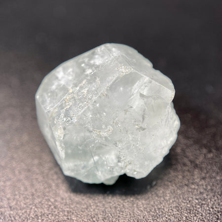 Madagascar phenakite crystal weighing 4.47 grams with black and brown tourmaline inclusions available at sanctuaryofstones.com photo 1