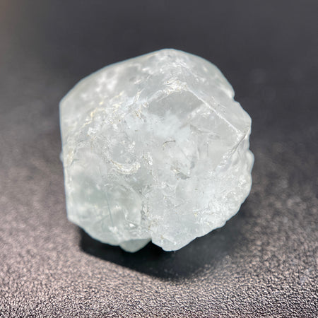 Madagascar phenakite crystal weighing 4.47 grams with black and brown tourmaline inclusions available at sanctuaryofstones.com photo 2