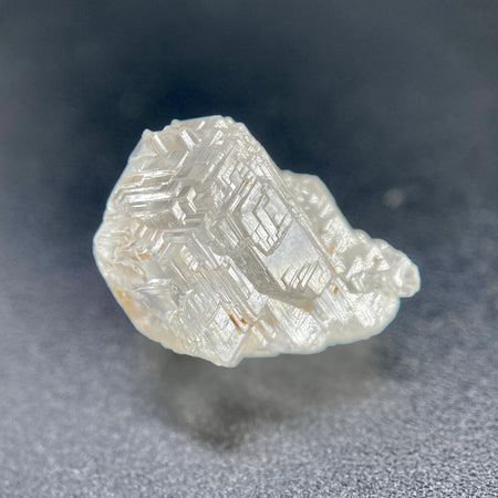 rare Nigerian Okuta-Didan phenakite crystal on black background. available at sanctuaryofstones.com