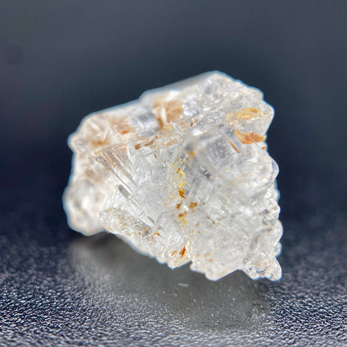 rare Nigerian Okuta-Didan phenakite crystal on black background. available at sanctuaryofstones.com