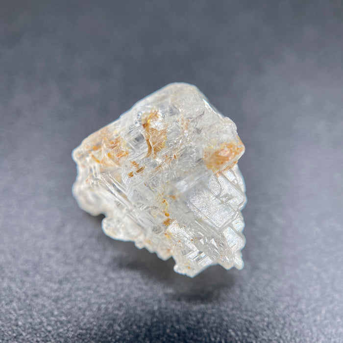 rare Nigerian Okuta-Didan phenakite crystal on black background. available at sanctuaryofstones.com