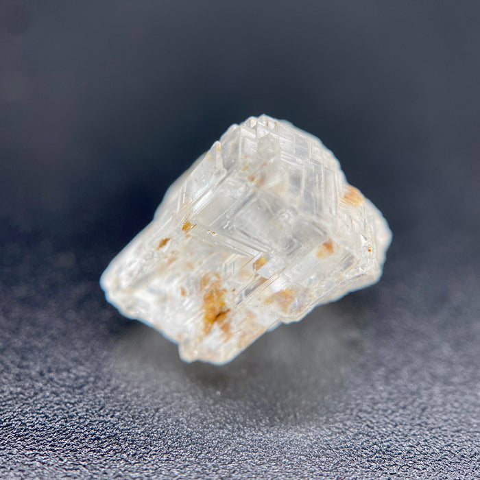 rare Nigerian Okuta-Didan phenakite crystal on black background. available at sanctuaryofstones.com