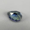 untreated peacock tanzanite pear cut gemstone, 1.88 carats, trichroic color phenomenon with blue, violet, fern-green colors, from sanctuary of stones dot com, image 8