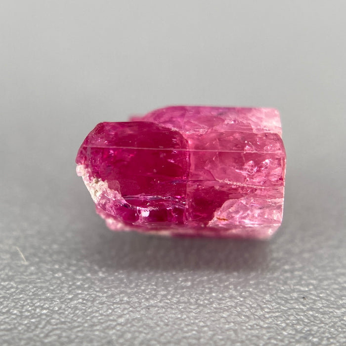extremely rare red beryl (bixbite) crystal raspberry red hexagonal crystal of 0.56 carats available at sanctuaryofstones.com