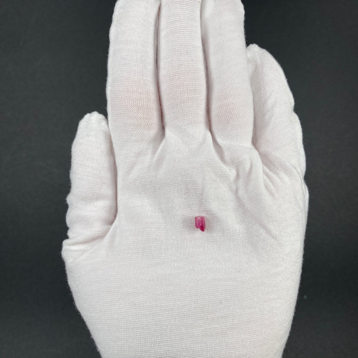 extremely rare red beryl (bixbite) crystal raspberry red hexagonal crystal of 0.56 carats available at sanctuaryofstones.com