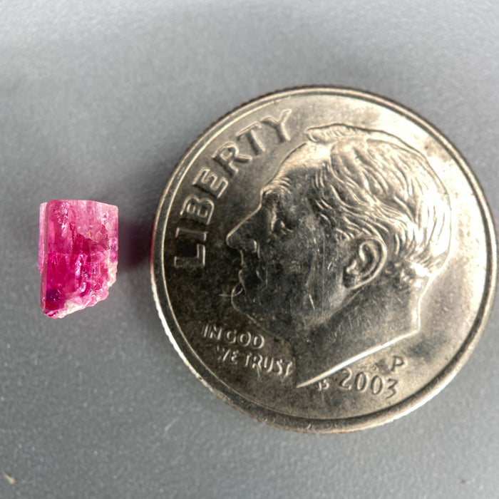 extremely rare red beryl (bixbite) crystal raspberry red hexagonal crystal of 0.56 carats available at sanctuaryofstones.com