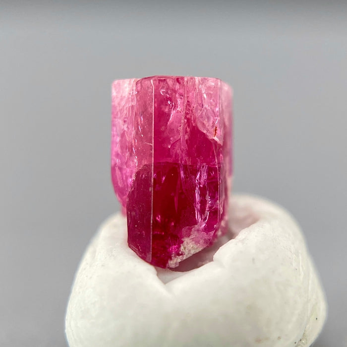 extremely rare red beryl (bixbite) crystal raspberry red hexagonal crystal of 0.56 carats available at sanctuaryofstones.com