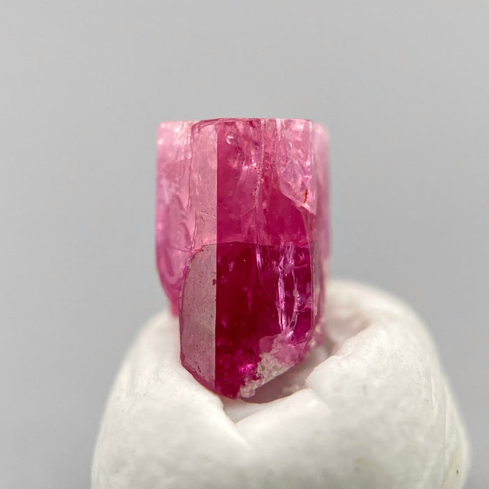 extremely rare red beryl (bixbite) crystal raspberry red hexagonal crystal of 0.56 carats available at sanctuaryofstones.com