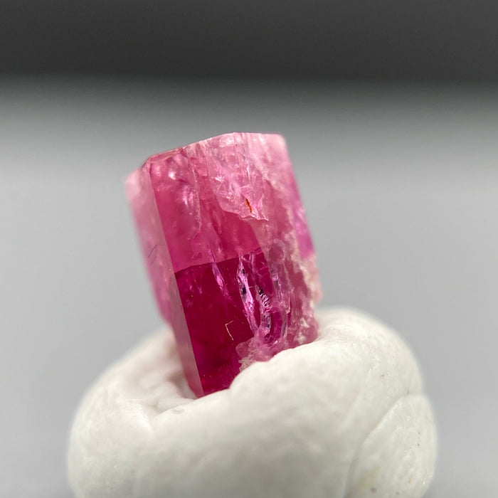 extremely rare red beryl (bixbite) crystal raspberry red hexagonal crystal of 0.56 carats available at sanctuaryofstones.com