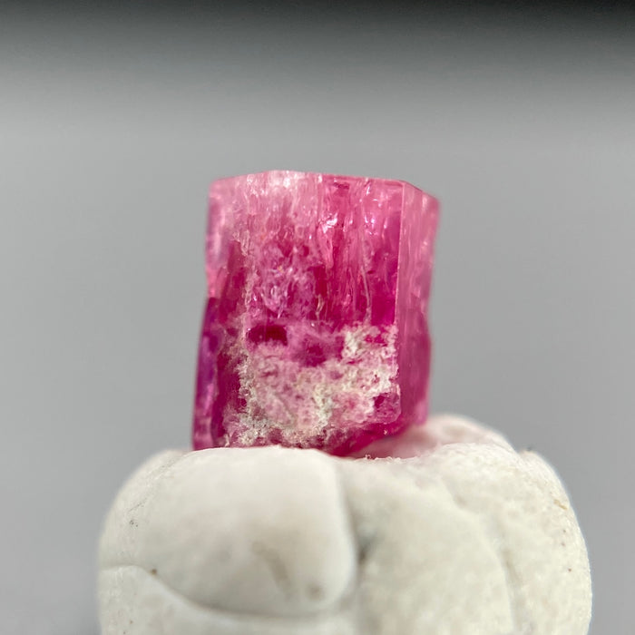 extremely rare red beryl (bixbite) crystal raspberry red hexagonal crystal of 0.56 carats available at sanctuaryofstones.com